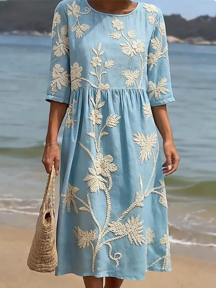 CLAUDETTE | FORGIVING DRAPE FLORAL MIDI DRESS