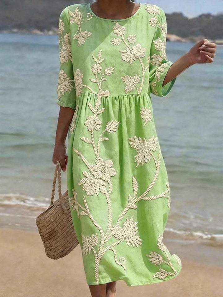 CLAUDETTE | FORGIVING DRAPE FLORAL MIDI DRESS